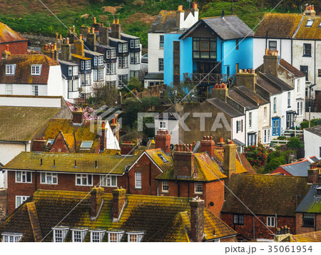 Roofs of buildings covered with green moss Roofs of buildings covered with green moss 35061954