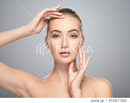 Beautiful face of young woman with perfect skin Beautiful face of young woman with perfect skin 35067360