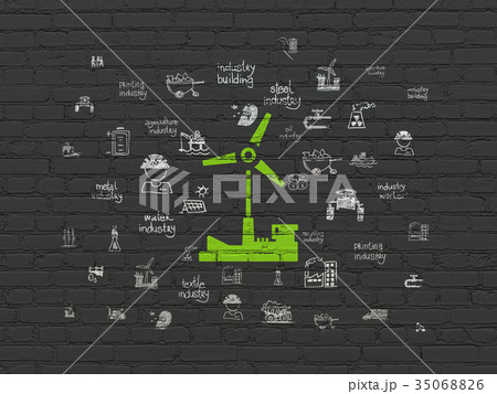 Manufacuring concept: Windmill on wall background 35068826
