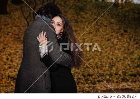 couple hugs in a fall park. Golden Autumn on the 35068827