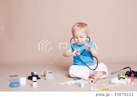 Boy playing in the doctor in the hospital 35070222