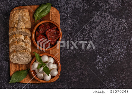Fresh bread with snacks. Fresh bread with snacks. 35070243