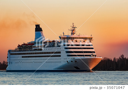 White cruise liner at sunset 35071047