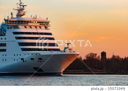 White cruise liner at sunset 35071049