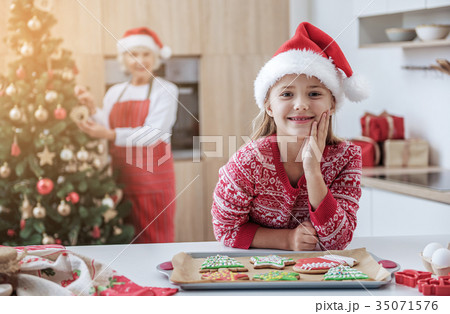 Happy family celebrating holiday with sweet 35071576