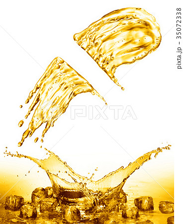 oil splash on gold bokeh background 35072338