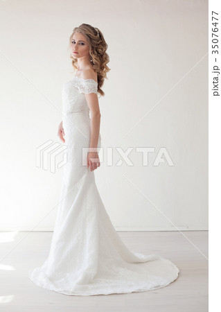 beautiful bride posing wedding hairstyle and dress beautiful bride posing wedding hairstyle and dress 35076477