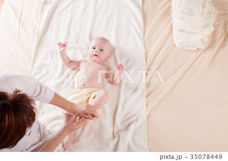 the little boy baby mother doing massage hands and the little boy baby mother doing massage hands and 35078449