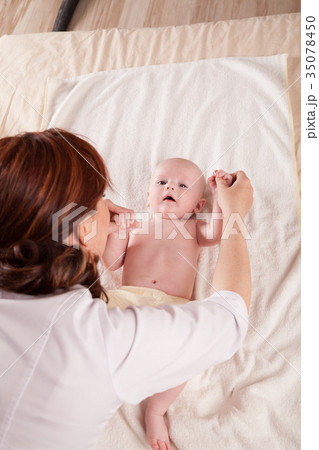 the little boy baby mother doing massage hands and the little boy baby mother doing massage hands and 35078450