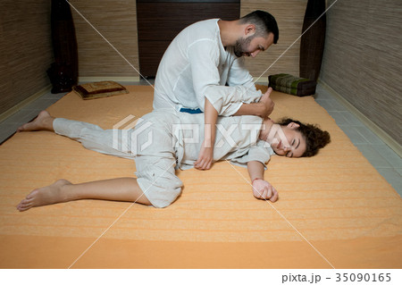 man and woman in white doing gymnastics man and woman in white doing gymnastics 35090165