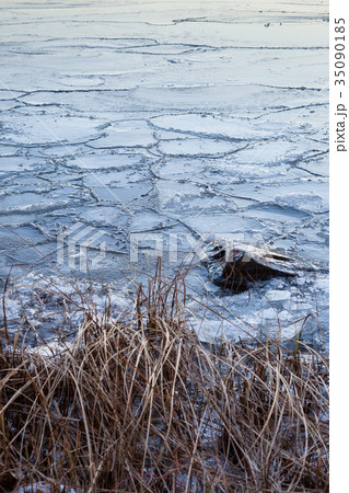 Pieces of ice in lake 35090185