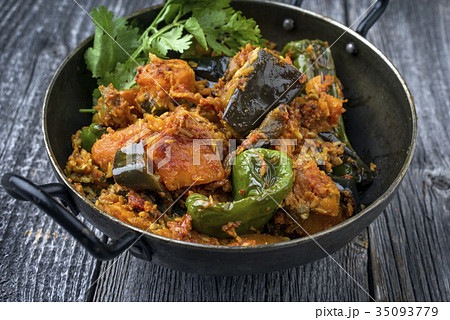 Indian Vegetable Curry Fry with Sweet Potatos  35093779