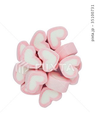 Pink heart shaped marshmallows isolated on white 35100731