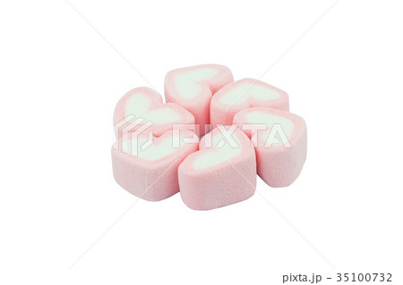 Pink heart shaped marshmallows isolated on white Pink heart shaped marshmallows isolated on white 35100732