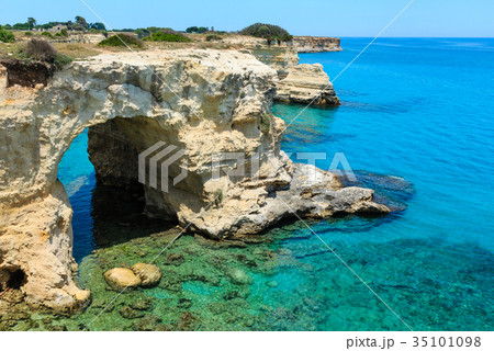 Faraglioni at Torre Sant Andrea, Italy 35101098