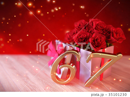 birthday concept with red roses in gift on wooden 35101230