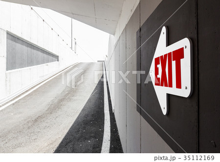 Arrow sign indicating the exit Arrow sign indicating the exit 35112169