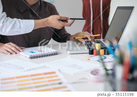 Two professional stylish fashion designer working as fashion des 35115198