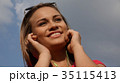 Woman Listening To Music 35115413