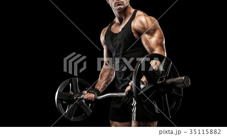 Young sexy bodybuilder with perfect body doing exercise with bar Young sexy bodybuilder with perfect body doing exercise with bar 35115882