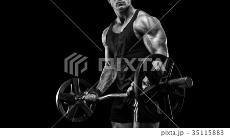 Young sexy bodybuilder with perfect body doing exercise with bar Young sexy bodybuilder with perfect body doing exercise with bar 35115883