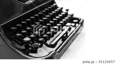 Old manual typewriter machine over white Old manual typewriter machine over white 35120057