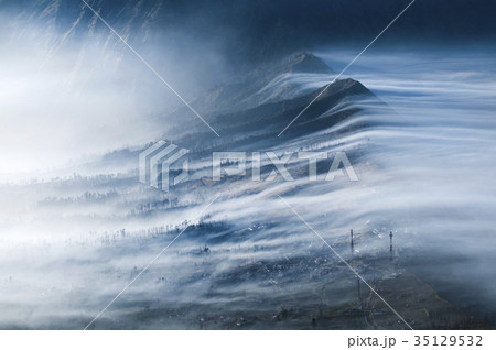 Mist Flowing over Cemoro Lawang 35129532