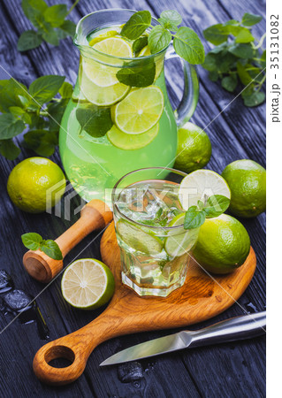lemonade mojito in a glass on a black wooden 35131082
