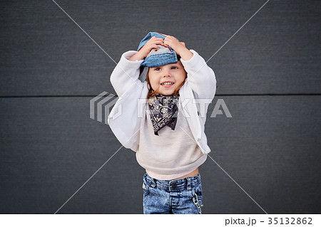 model child hip-hop.baby in a baseball cap. 35132862
