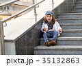 model child hip-hop sitting on stairs outdoor 35132863