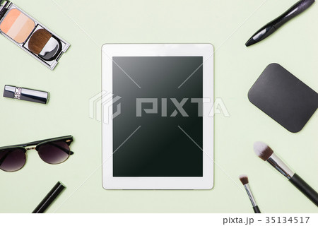 Flat lay of make up cosmetic with digital tablet Flat lay of make up cosmetic with digital tablet 35134517