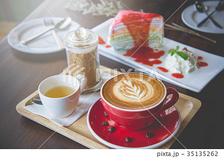 aroma coffee red cup latte art and tasty cake aroma coffee red cup latte art and tasty cake 35135262