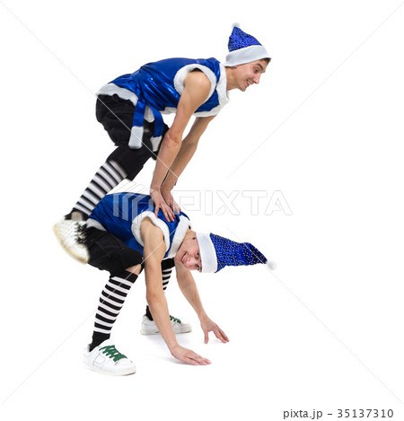 two Christmas men in blue santa clothes dancing 35137310