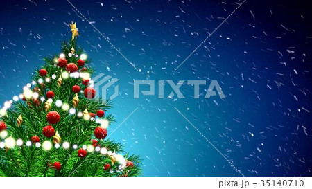 green Christmas tree over blue background with 35140710