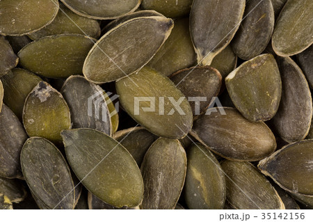 Pumpkin seeds close up 35142156
