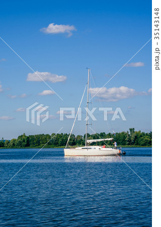 White Sailing Boat on the River. White Sailing Boat on the River. 35143148