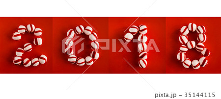 2018 numbers with red and white candies 35144115