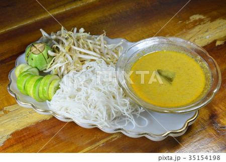 rice noodle and fish curry sauce with vegetable rice noodle and fish curry sauce with vegetable 35154198