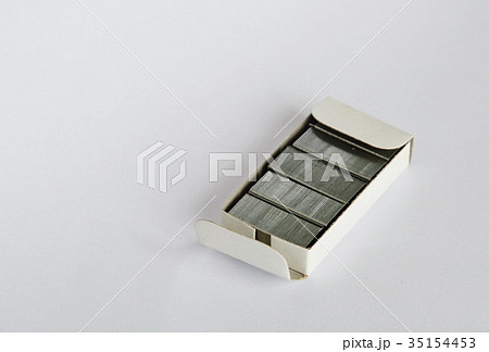 stapler wire in paper box on white background 35154453