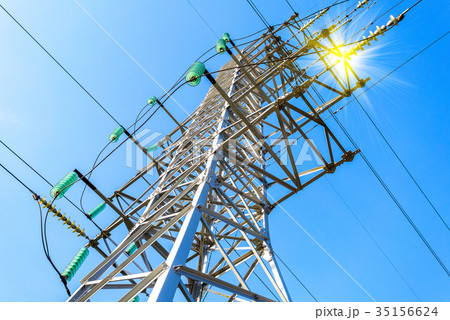 High voltage electric tower against the blue sky High voltage electric tower against the blue sky 35156624