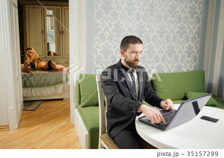 Indoor portrait of young couple, husband and wife Indoor portrait of young couple, husband and wife 35157299