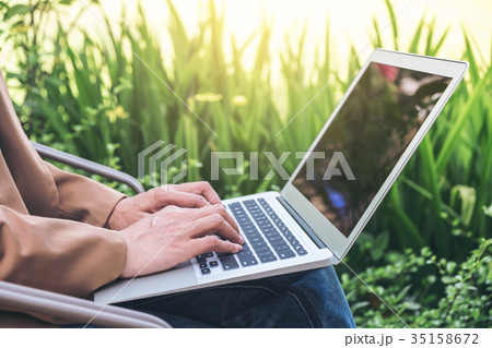 Work and relax, Woman freelancer is working on computer laptop, 35158672
