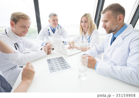 Group of medics with x-ray scan 35159908