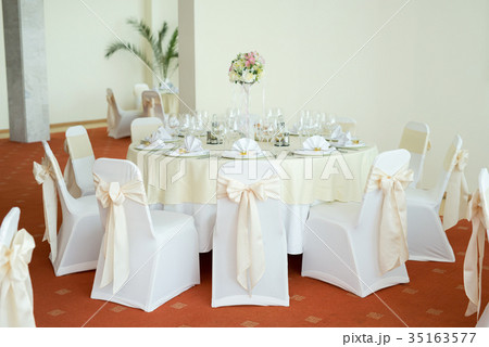 Beautiful wedding decoration on a table Beautiful wedding decoration on a table 35163577
