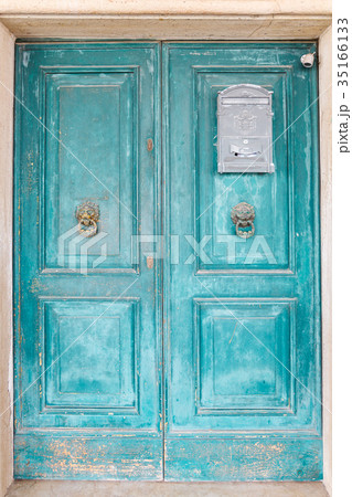 Od blue door on the island Burano, Venice, Italy Od blue door on the island Burano, Venice, Italy 35166133