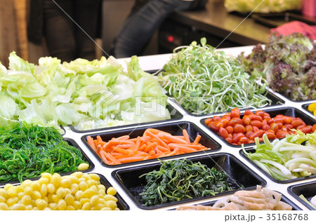 Various vegetables mixed on salad bar. 35168768