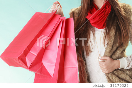 Closeup of customer bags shopping. Winter fashion. Closeup of customer bags shopping. Winter fashion. 35179323