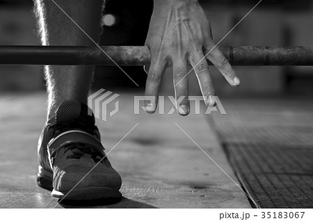 Male hand holding barbell before training Male hand holding barbell before training 35183067