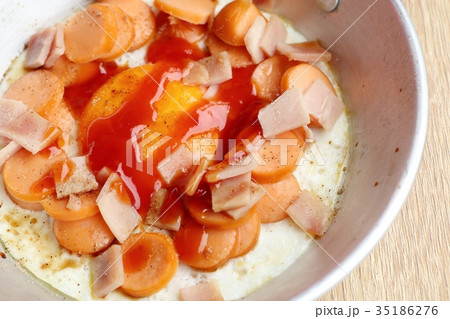 pan fried egg with toppings pan fried egg with toppings 35186276