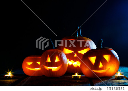 Halloween pumpkins and candles Halloween pumpkins and candles 35186581